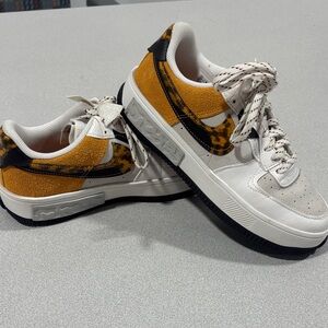 Nike Women's Air Force One Sneakers in White Tortoise Shell Black & Orange-ish